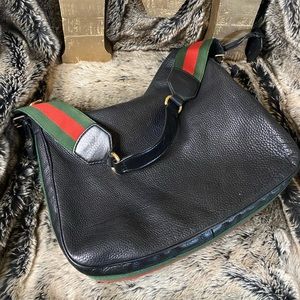 Gucci Leather Hobo with stripe strap.